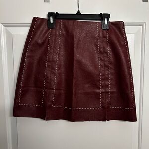 Dark red leather skirt with white stitching - originally from Francesca’s